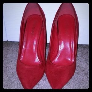 Red suede pumps